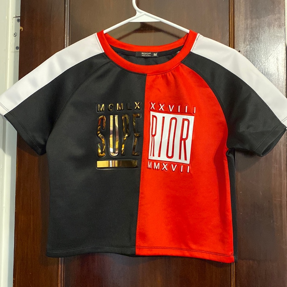 Medium size half black & red shirt